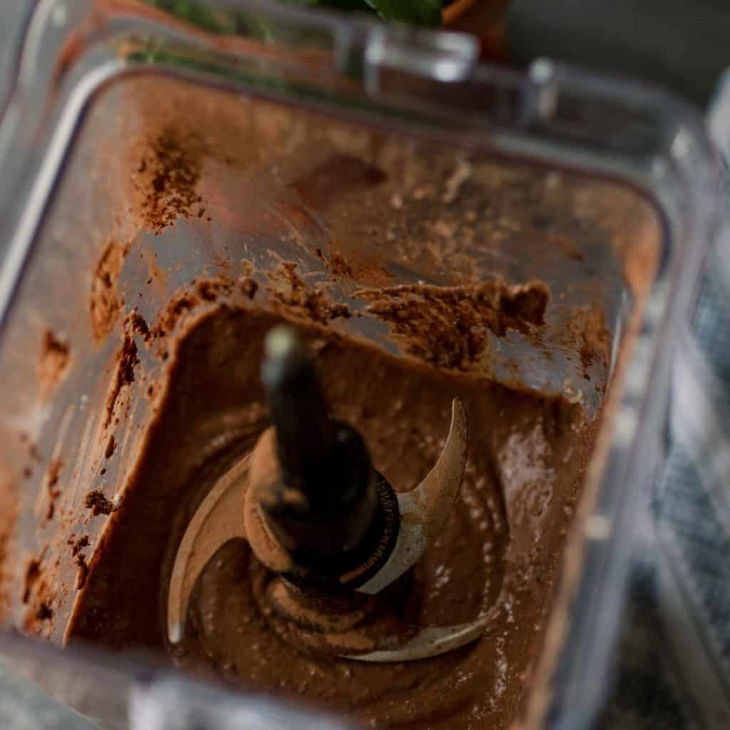Mixing wet ingredients to make Peanut Butter Chocolate Black Bean Brownies
