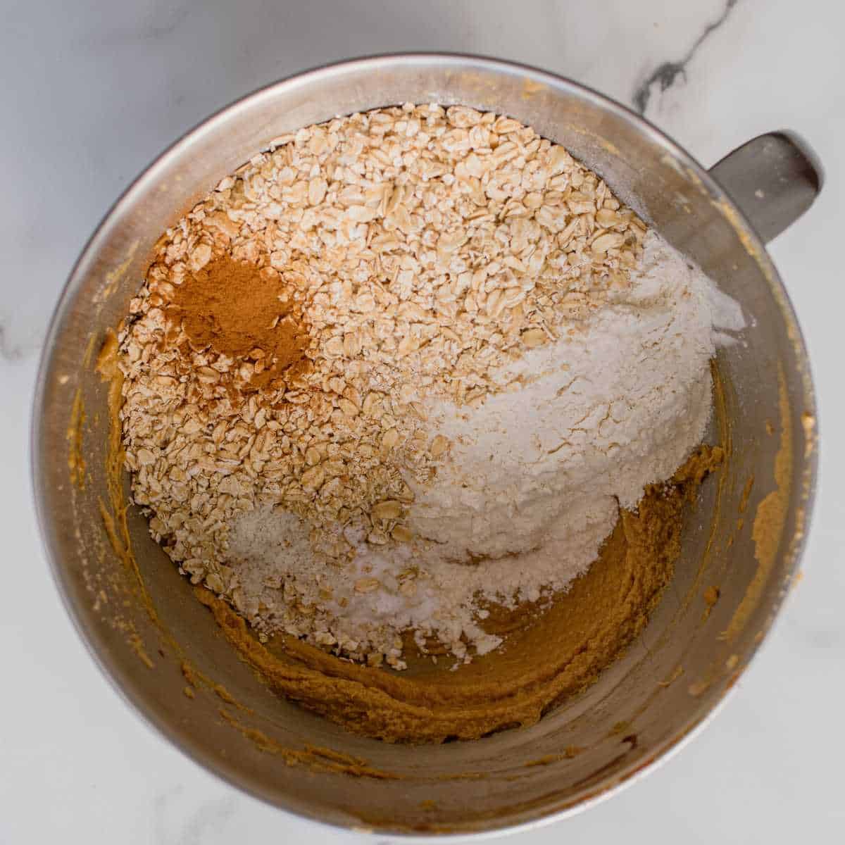 an overhead shot of a mixing bowl combining the wet and dry ingredients.
