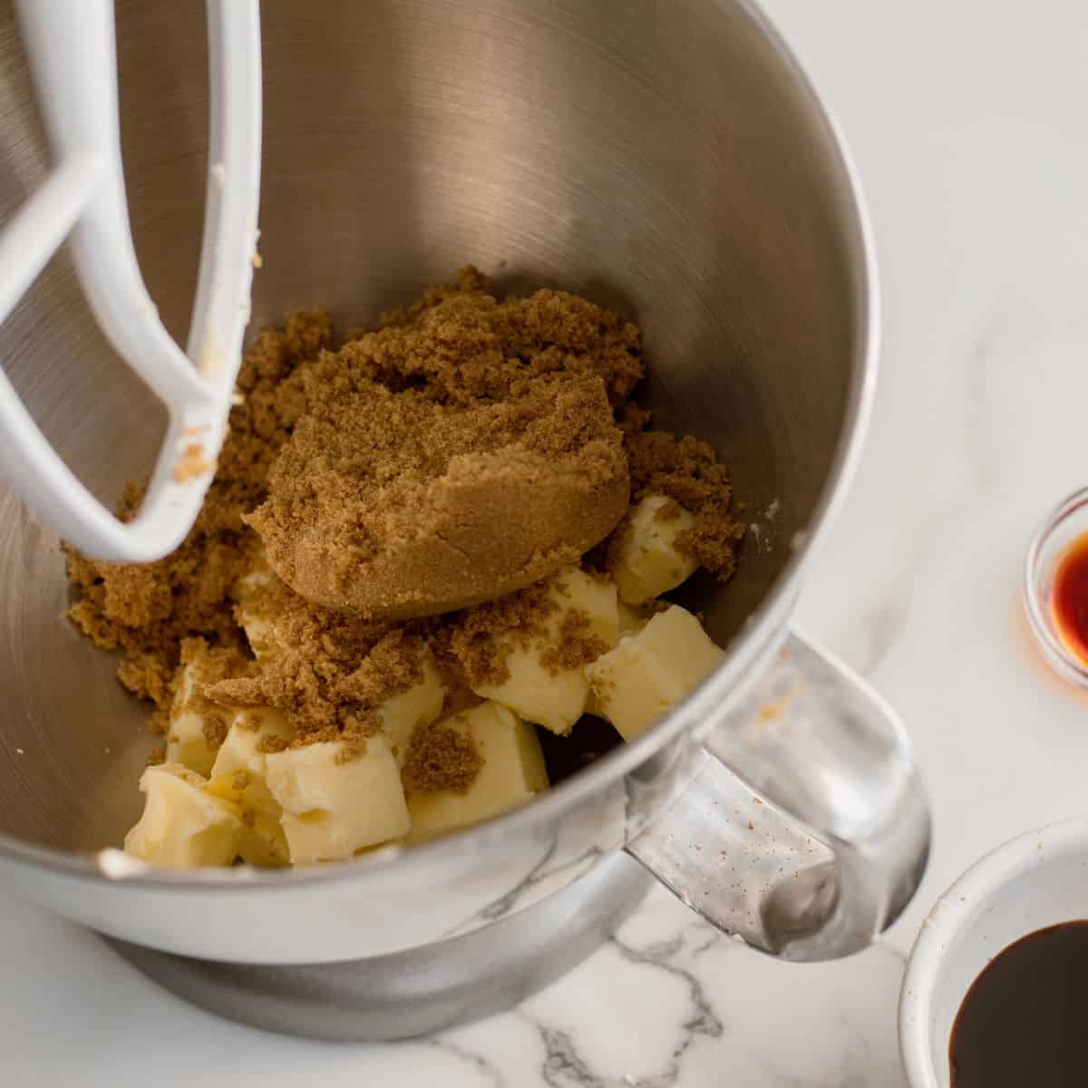 a shot down into a mixing bowl with brown sugar and butter.